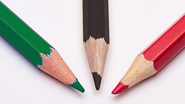 A picture of three coloured pencils
